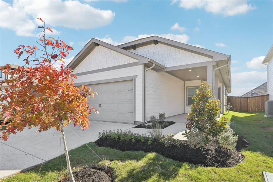 Front exterior of a new home in Lakehaven - Spring Series, Farmersville, TX, highlighting curb appeal (Image 20).