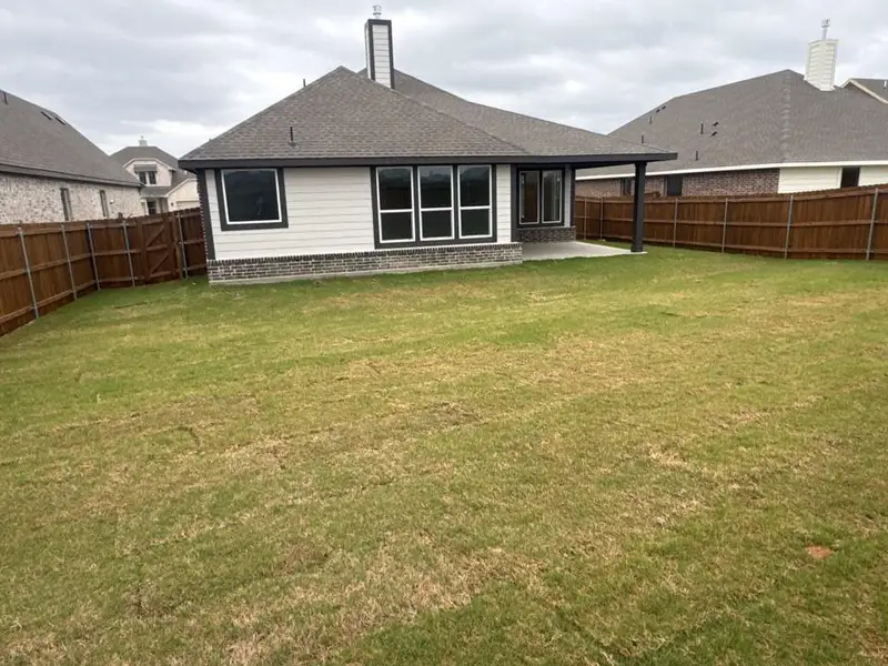 Exterior details and patio area of a home in Cedar Ridge Estates, Anna (Image 4).