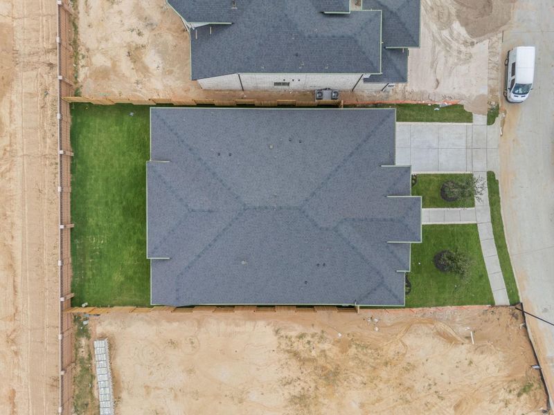 The home is a large one-story, but still has yard space remaining