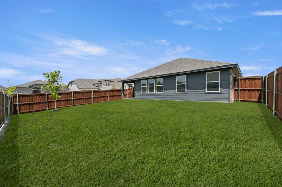 Front exterior of a new home in De Berry Reserve, Royse City, TX, highlighting curb appeal (Image 27). Front exterior of a new home in De Berry Reserve, Royse City, TX, highlighting curb appeal (Image 27).