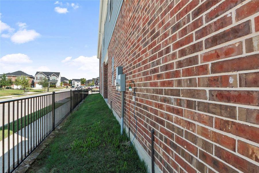 Exterior details and patio area of a home in Bayside, Rowlett (Image 2). Exterior details and patio area of a home in Bayside, Rowlett (Image 2).