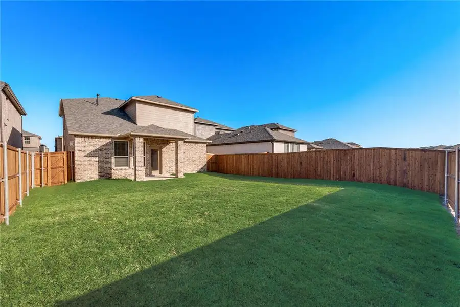 Exterior details and patio area of a home in AnaCapri, Anna (Image 4). Exterior details and patio area of a home in AnaCapri, Anna (Image 4).