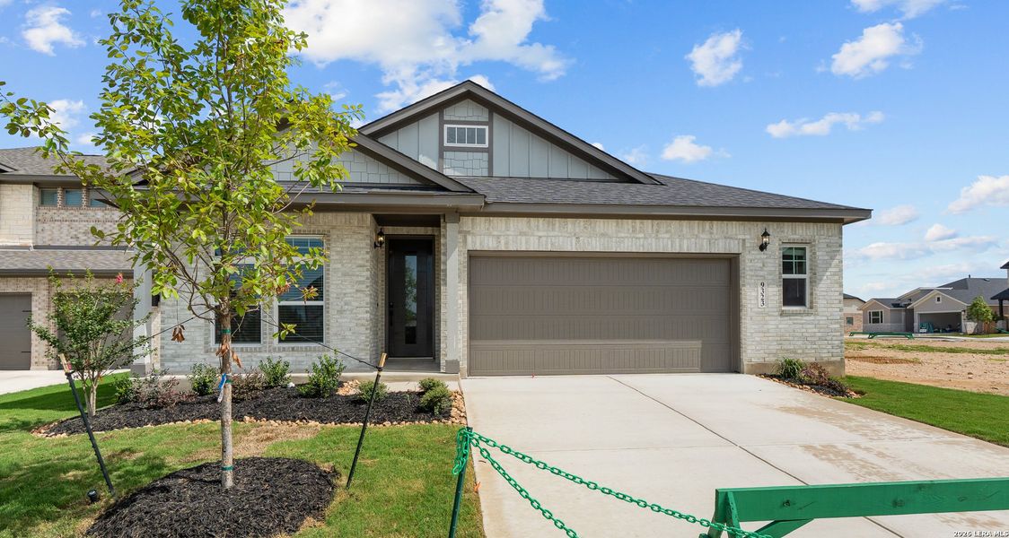 Front exterior of a new home in Stillwater Ranch, San Antonio, TX, highlighting curb appeal (Image 1). Front exterior of a new home in Stillwater Ranch, San Antonio, TX, highlighting curb appeal (Image 1).