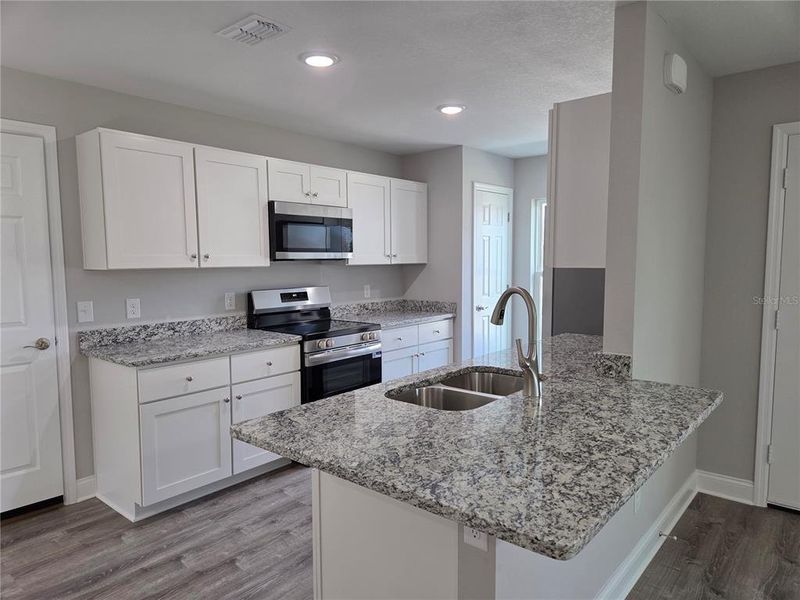 Furnished interior view inside a new home in , Lake Wales (Image 6).