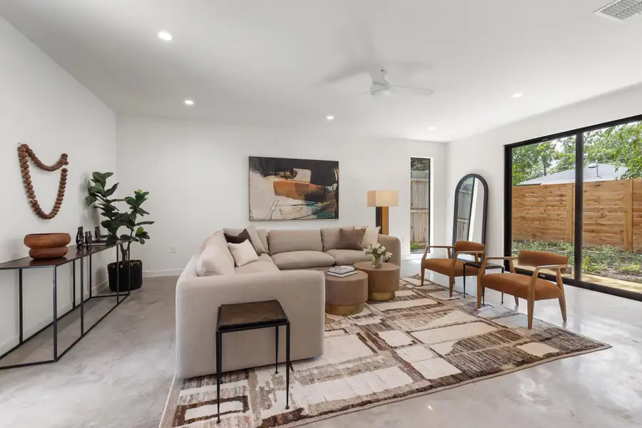 The spacious living area provides a comfortable setting for relaxing and entertaining. The spacious living area provides a comfortable setting for relaxing and entertaining.