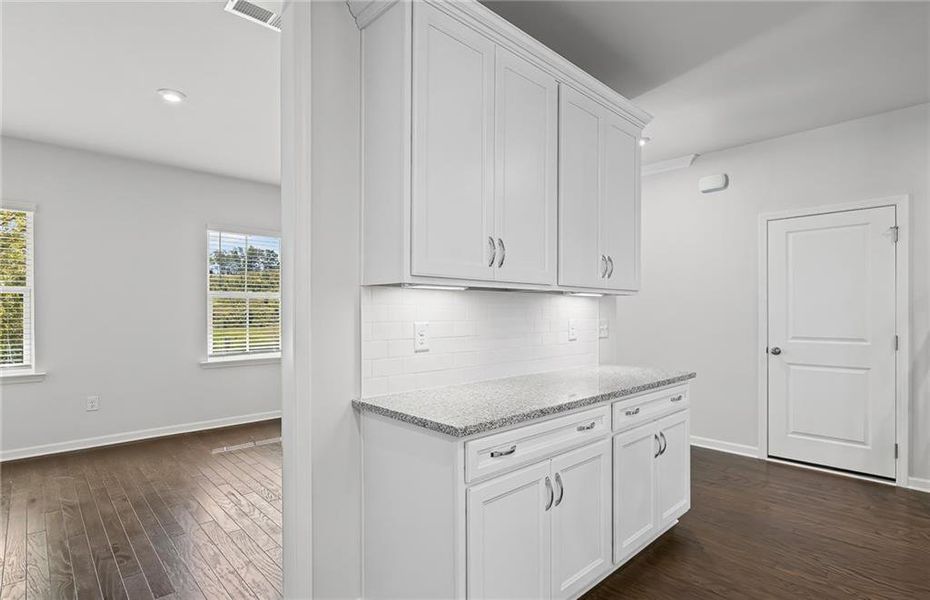 Furnished interior view inside a new home in Watermist at Mirror Lake, Villa Rica (Image 13).
