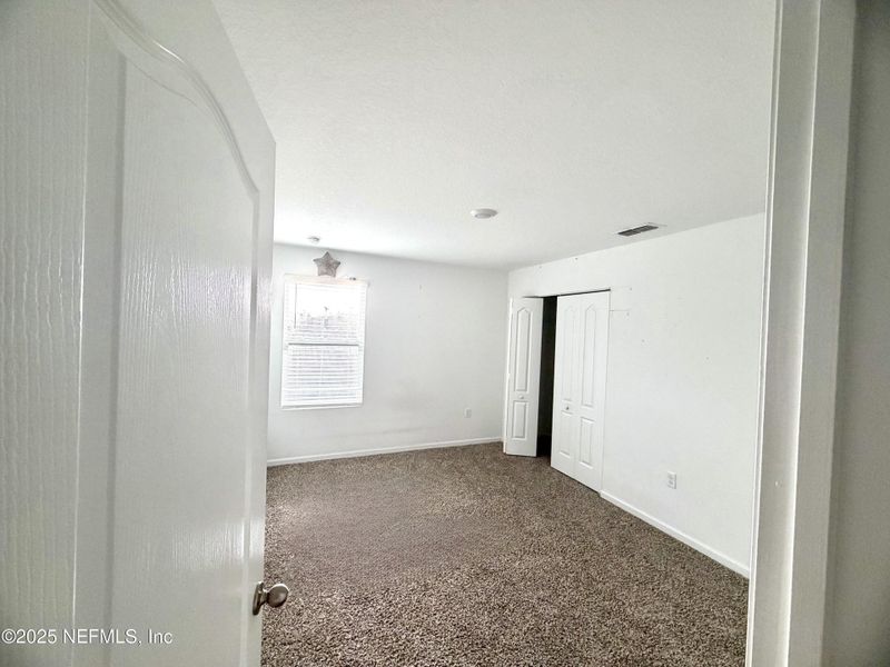 Spacious, unfurnished interior of a new home in The Arbors, Jacksonville (Image 11).