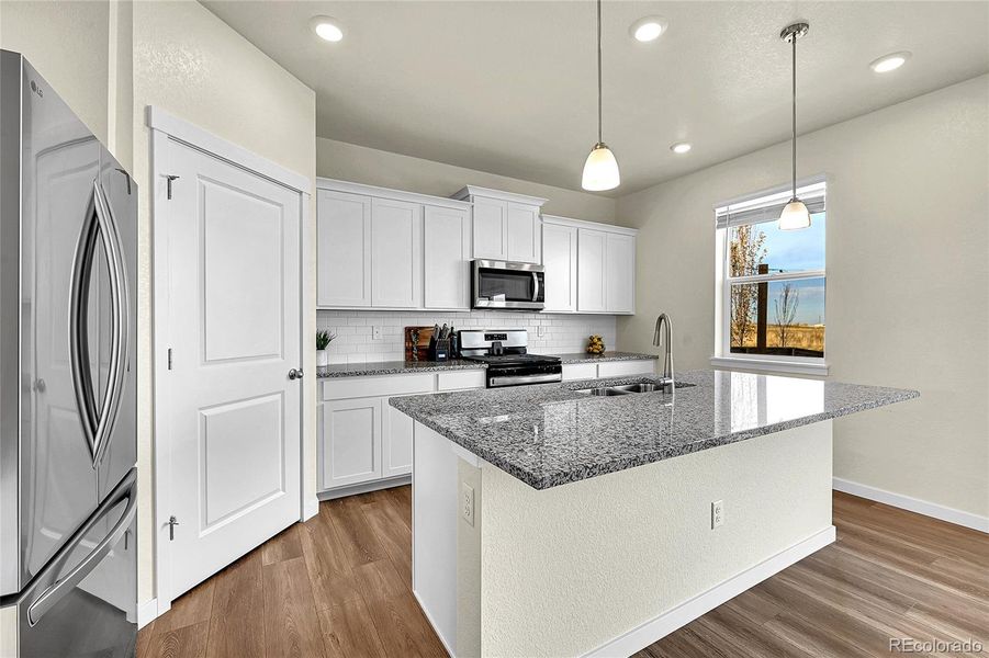 Furnished interior view inside a new home in Settlers Crossing, Commerce City (Image 26).