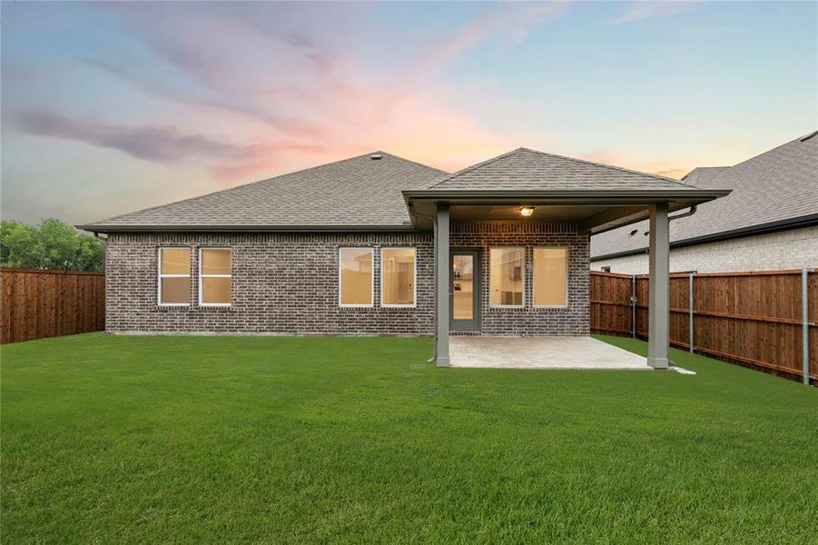 Exterior details and patio area of a home in Creekside, Royse City (Image 3).