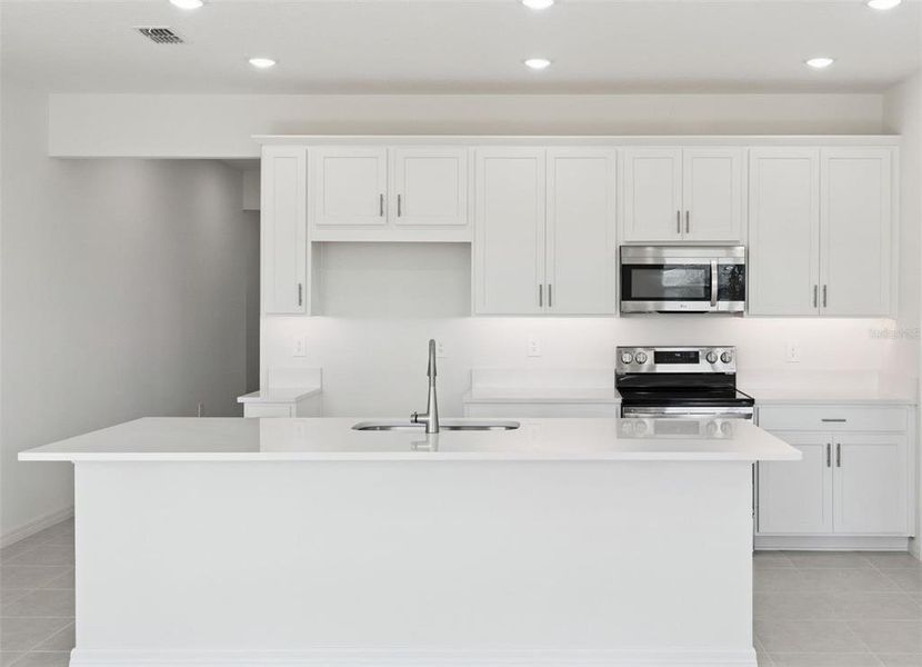 Furnished interior view inside a new home in Estes Reserve, Eustis (Image 5).