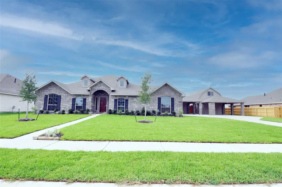 Front exterior of a new home in , League City, TX, highlighting curb appeal (Image 24).