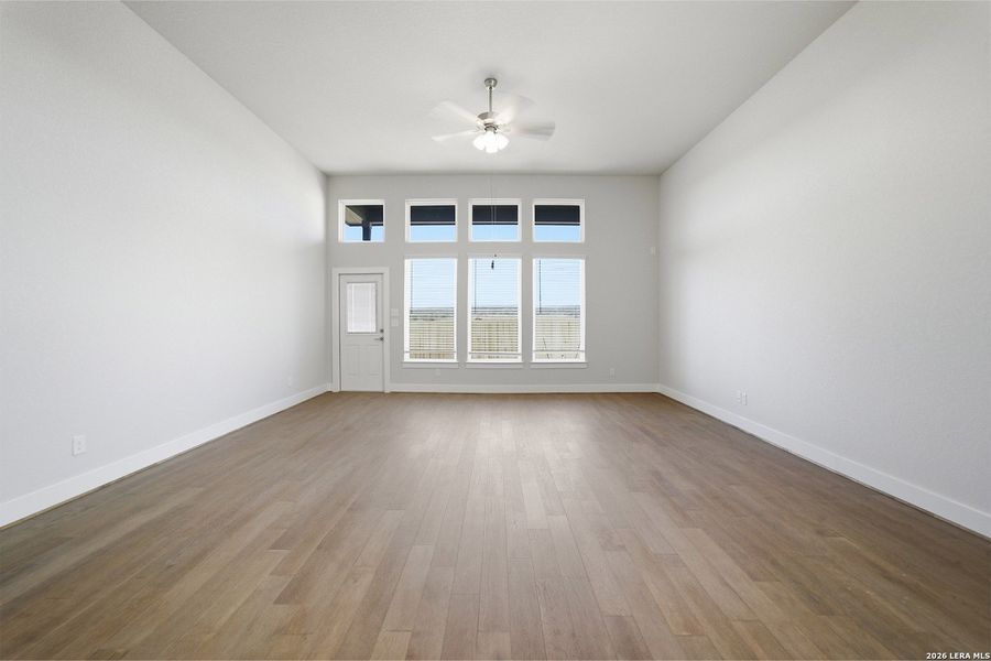 Spacious, unfurnished interior of a new home in The Woodlands at Medina Hills, Mico (Image 21).