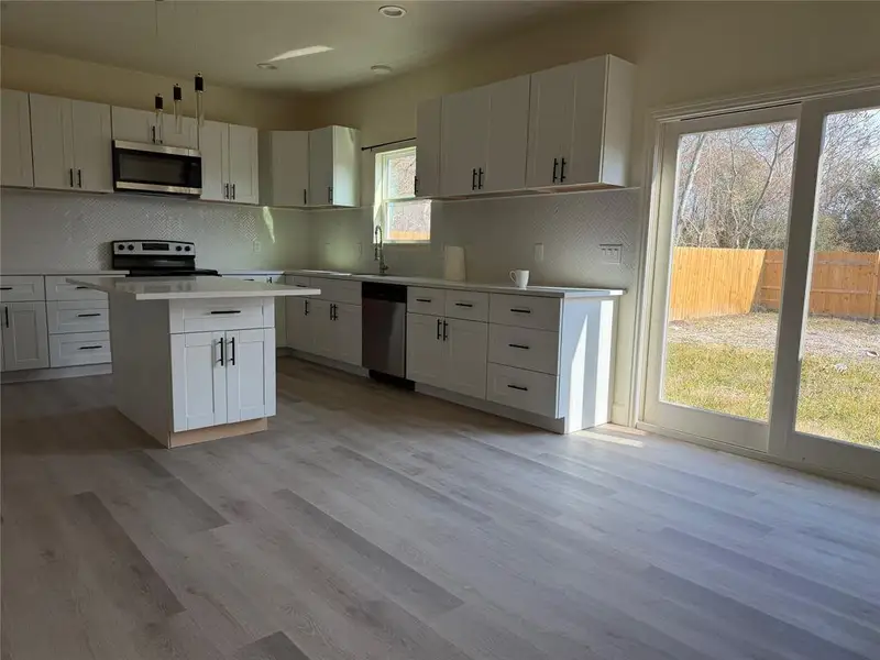 Furnished interior view inside a new home in , Dallas (Image 7).
