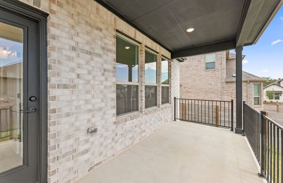 Exterior details and patio area of a home in Bluffview Reserve, Leander (Image 27).