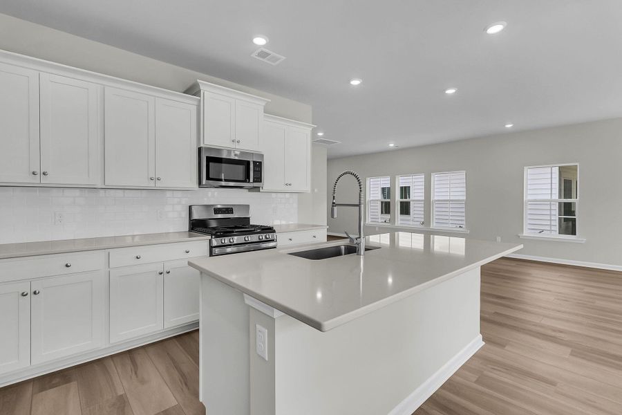 Furnished interior view inside a new home in Horizons at Summers Corner | 55+: The Cottages, Summerville (Image 8). Furnished interior view inside a new home in Horizons at Summers Corner | 55+: The Cottages, Summerville (Image 8).
