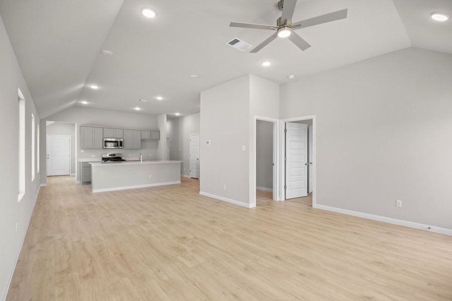 Living Room in the Spruce home plan by Trophy Signature Homes - REPRESENTATIVE PHOTO Living Room in the Spruce home plan by Trophy Signature Homes - REPRESENTATIVE PHOTO