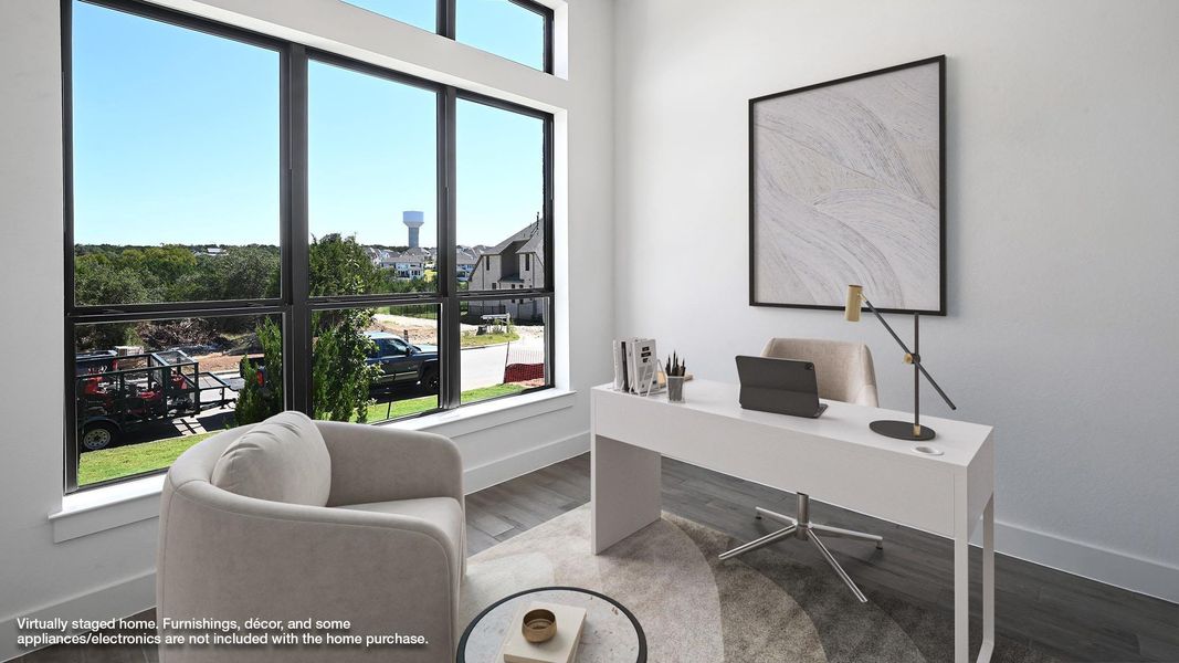 Office featuring wood finished floors and baseboards Office featuring wood finished floors and baseboards