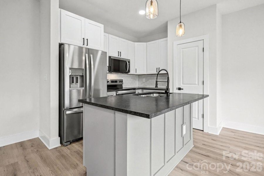 Furnished interior view inside a new home in , Charlotte (Image 5). Furnished interior view inside a new home in , Charlotte (Image 5).