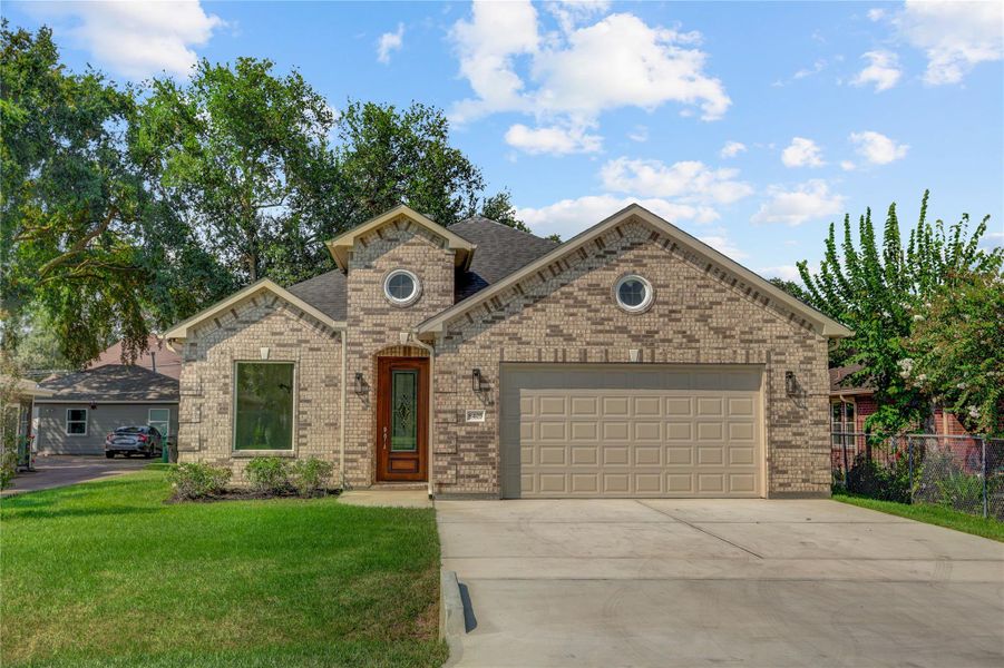 Front exterior of a new home in , Houston, TX, highlighting curb appeal (Image 22).