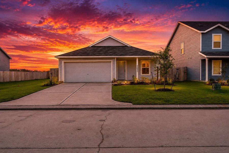 Stunning twilight view of the front of the home. Stunning twilight view of the front of the home.