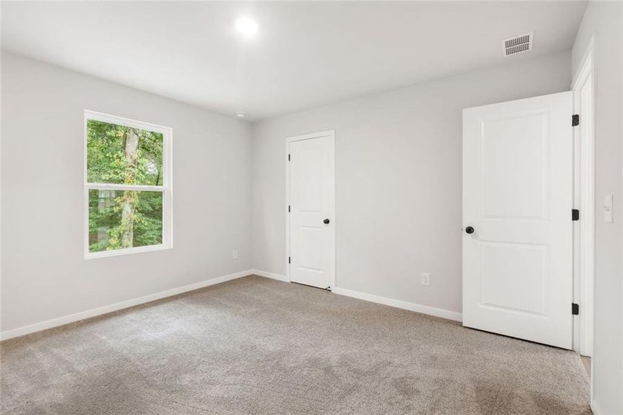 Spacious, unfurnished interior of a new home in Windsong Estates, McDonough (Image 27).