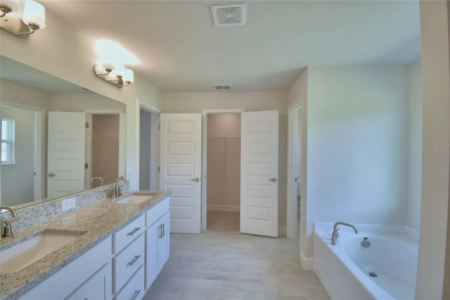 Furnished interior view inside a new home in Lake Juliana Estates, Auburndale (Image 10).