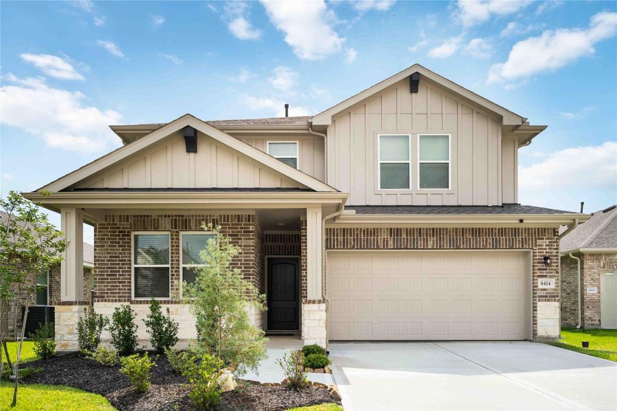 Front exterior of a new home in Ascend at Legends Bay, Baytown, TX, highlighting curb appeal (Image 2). Front exterior of a new home in Ascend at Legends Bay, Baytown, TX, highlighting curb appeal (Image 2).