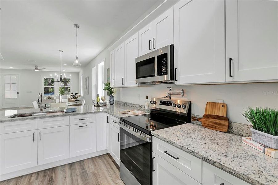 Furnished interior view inside a new home in , Tampa (Image 11). Furnished interior view inside a new home in , Tampa (Image 11).