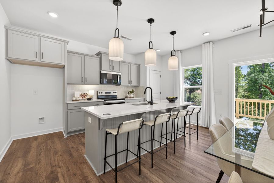 Furnished interior view inside a new home in White Oak Creek Crossing, Angier (Image 4).