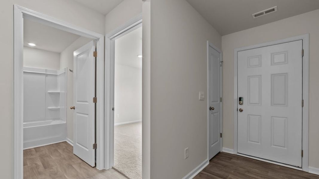 Representative unfurnished interior of a home built from the Cali by D.R. Horton in Hobbs Farm, Ayden (Image 13).