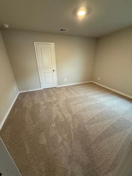 Spacious, unfurnished interior of a new home in Southern Pointe, College Station (Image 7).