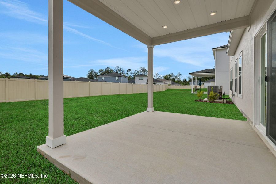 Exterior details and patio area of a home in Wilford Oaks, Orange Park (Image 26).