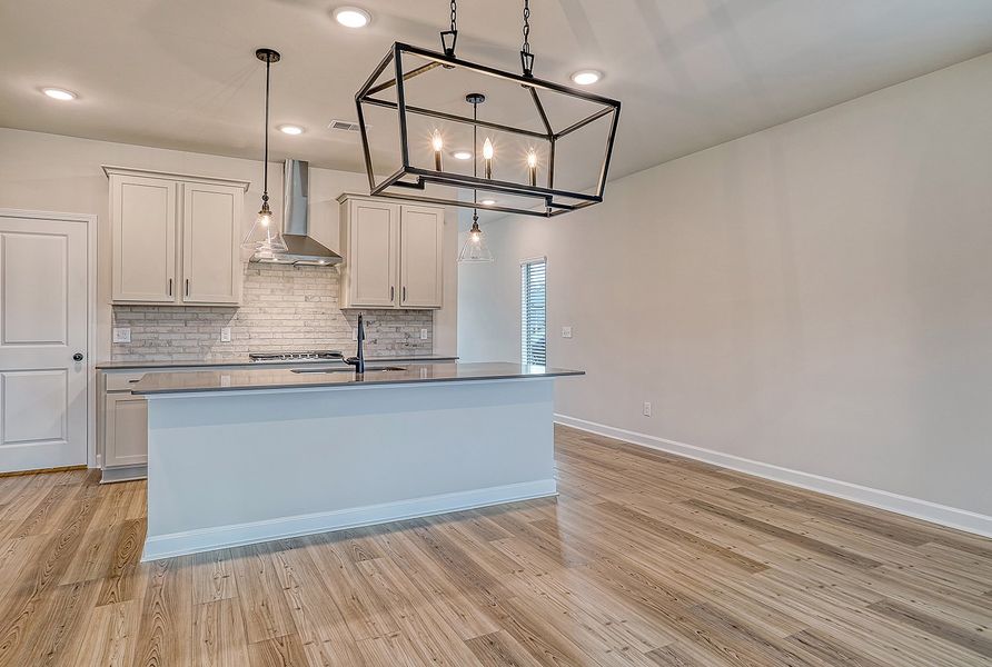 Representative furnished interior of a home built from the Washington by Ashton Woods in Watson Hill, Summerville (Image 4).