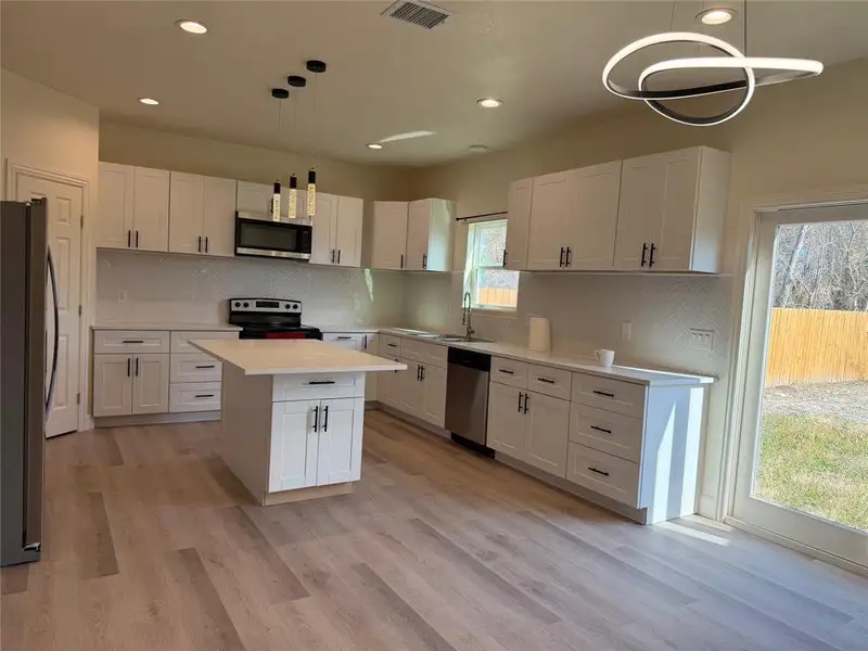 Furnished interior view inside a new home in , Dallas (Image 6).