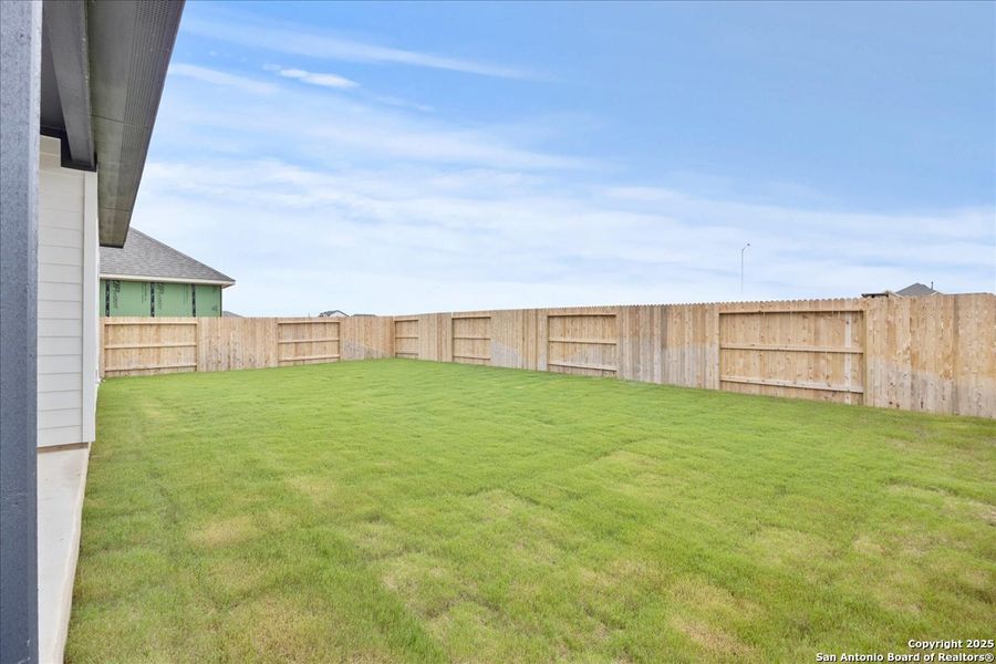 Front exterior of a new home in Village at Three Oaks, Seguin, TX, highlighting curb appeal (Image 15). Front exterior of a new home in Village at Three Oaks, Seguin, TX, highlighting curb appeal (Image 15).