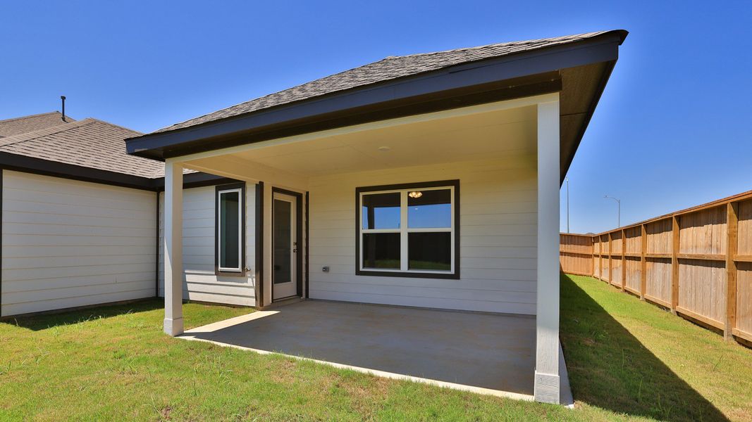 Exterior details and patio area of a home in Oakwood Estates, Waller (Image 3).
