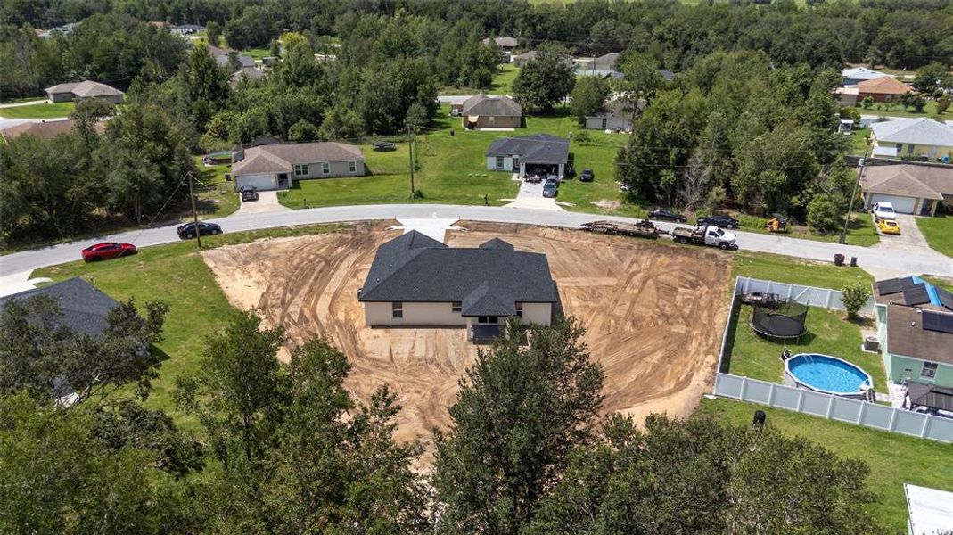 Front exterior of a new home in , Ocala, FL, highlighting curb appeal (Image 24). Front exterior of a new home in , Ocala, FL, highlighting curb appeal (Image 24).