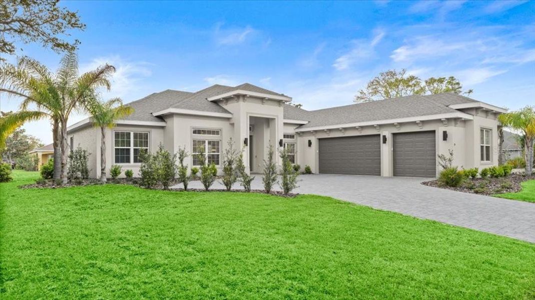 Front exterior of a new home in , Palm Coast, FL, highlighting curb appeal (Image 2).