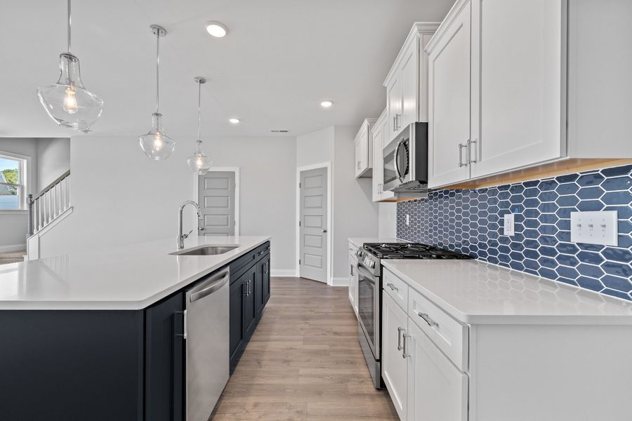 Representative furnished interior of a home built from the The Hemlock by RobuckHomes in Kennebec Crossing, Angier (Image 8).