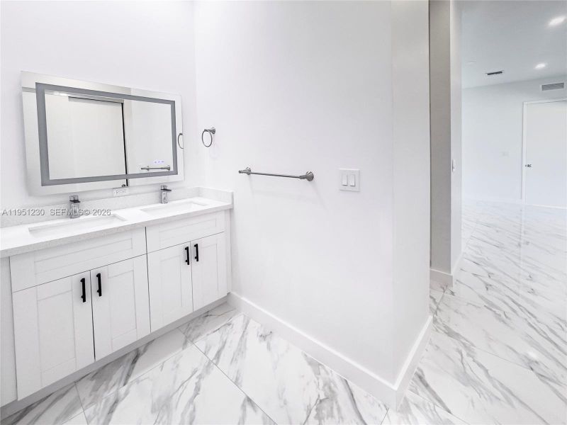 Furnished interior view inside a new home in , Port St. Lucie (Image 9).