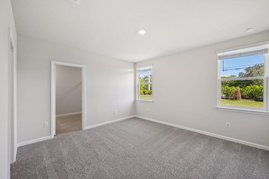 Spacious, unfurnished interior of a new home in Hampton Park - Classic Series, Vero Beach (Image 25). Spacious, unfurnished interior of a new home in Hampton Park - Classic Series, Vero Beach (Image 25).