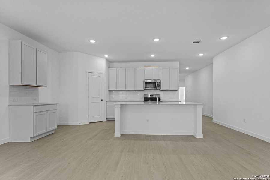 Furnished interior view inside a new home in Hidden Trails: Coastline Collection, Bulverde (Image 8).