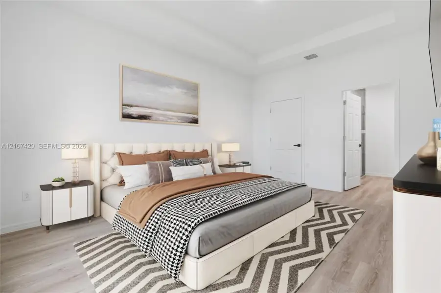 Tray ceiling, wood-finish flooring, and six-panel interior doors Tray ceiling, wood-finish flooring, and six-panel interior doors
