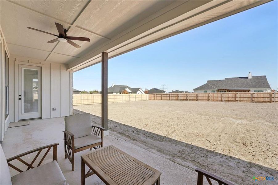 A spacious backyard with a private fence, ready for personalized landscaping and outdoor enjoyment. A spacious backyard with a private fence, ready for personalized landscaping and outdoor enjoyment.