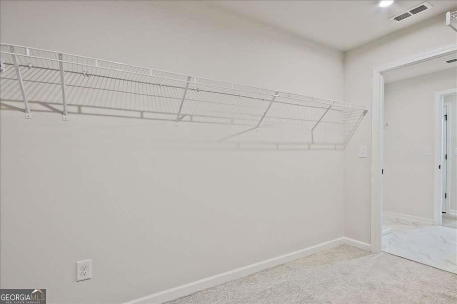 Spacious, unfurnished interior of a new home in The Paddocks at Doc Hughes, Buford (Image 35).