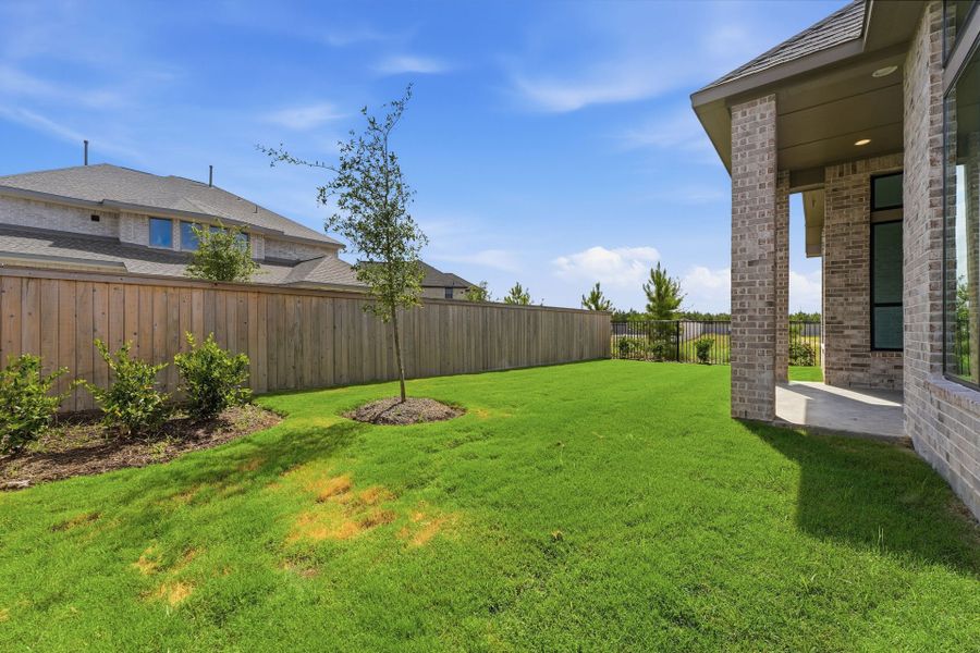 Exterior details and patio area of a home in Bridgeland 50′, Cypress (Image 20).