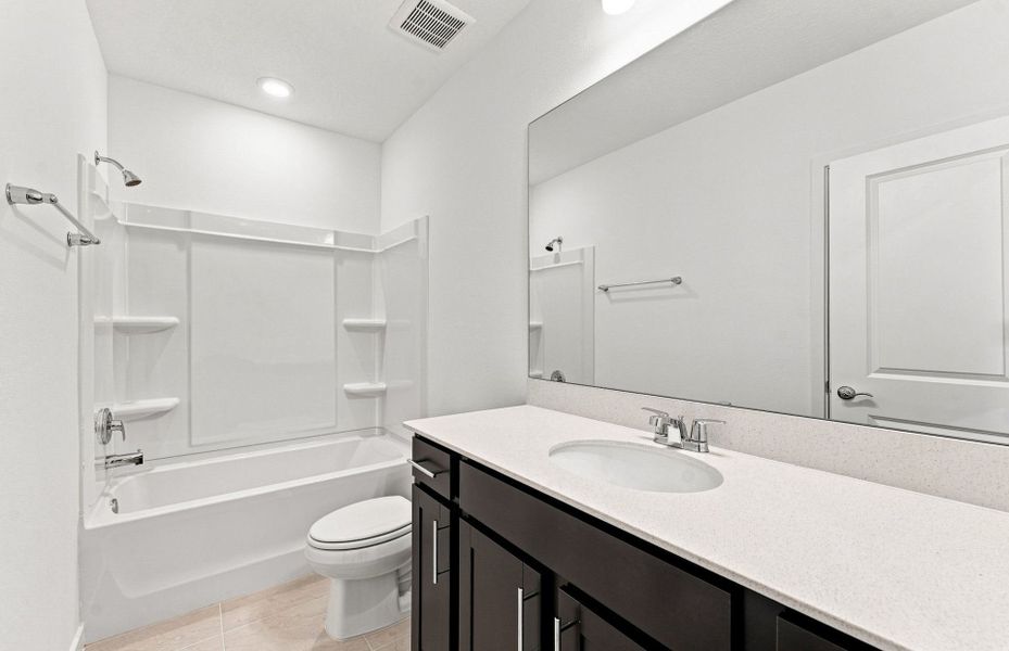 Furnished interior view inside a new home in Twisted Oaks, Wildwood (Image 8).