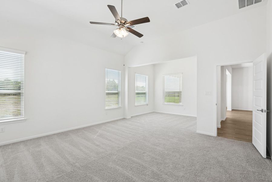 Spacious primary suite with sitting room (*Photo not of actual home and used for illustration purposes only.)