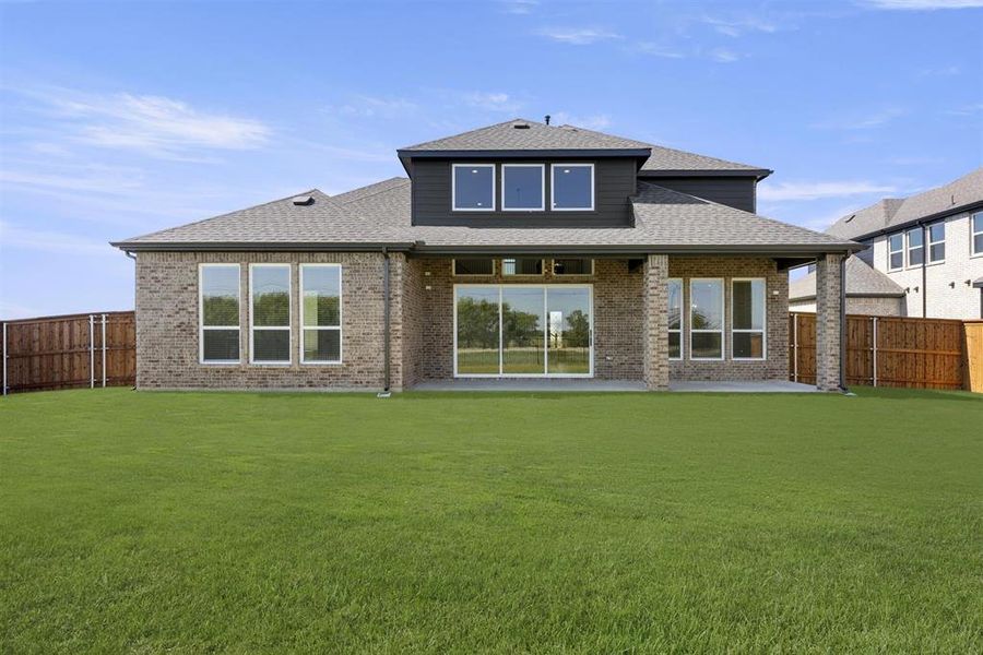Front exterior of a new home in Polo Ridge, Mesquite, TX, highlighting curb appeal (Image 19). Front exterior of a new home in Polo Ridge, Mesquite, TX, highlighting curb appeal (Image 19).