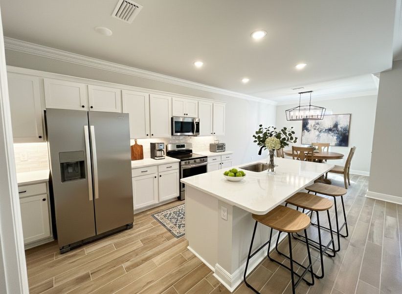 Front exterior of a new home in Natureview, Freeport, FL, highlighting curb appeal (Image 15).